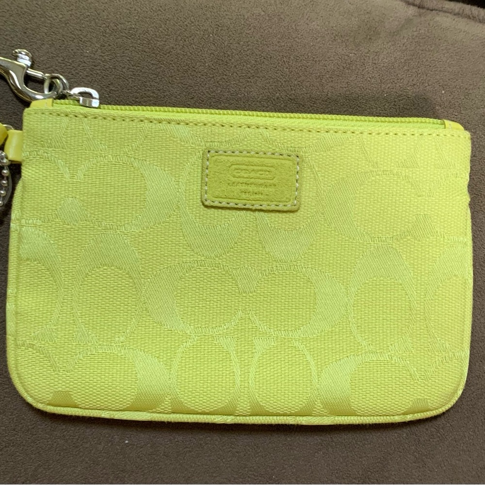 Coach Wristlet with Signature C Coach Canvas in Neon green/yellow